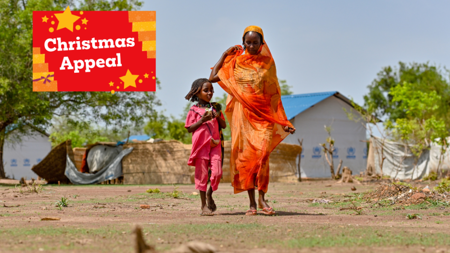 Shede and her daughter, walking together.
